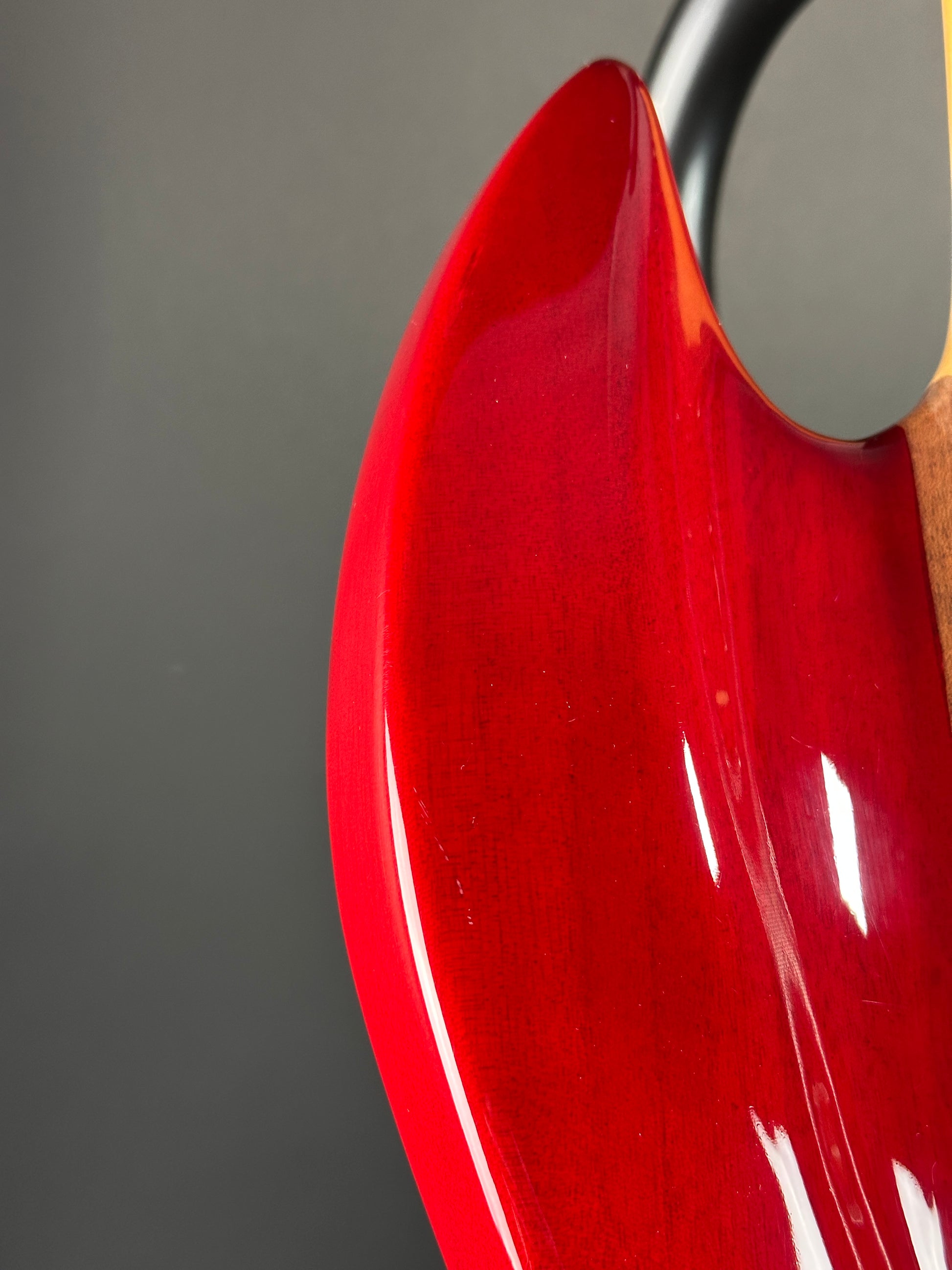 Scratches on horn of Used Lace Helix Bass Red.