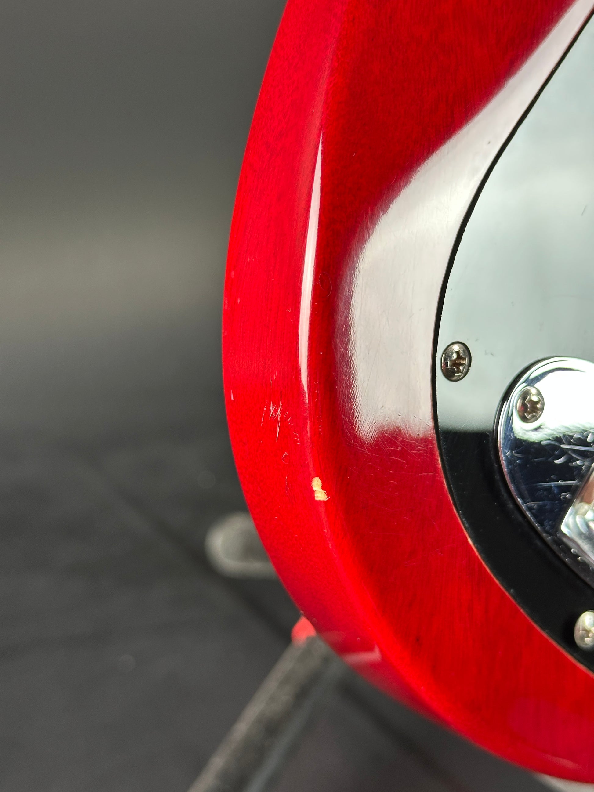 Wear on bottom edge of Used Lace Helix Bass Red.