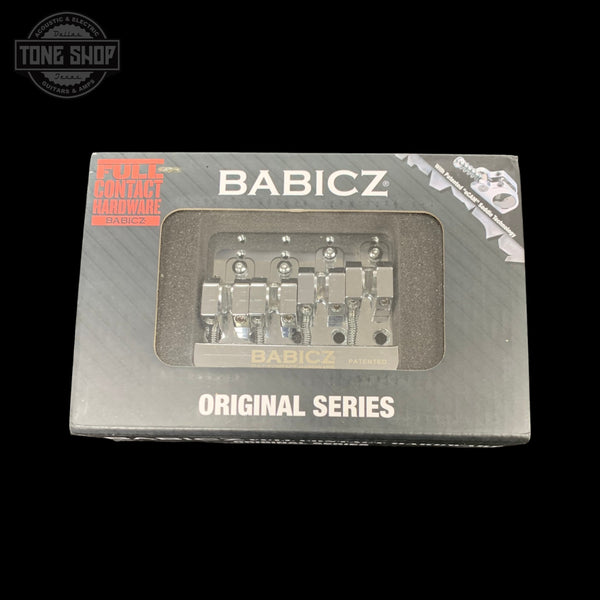 Top of case of Used Babicz Original Series Full Contact Bass Bridge.