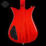 Red electric guitar body with a visible brand logo in the corner.