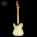 A Fender Telecaster electric guitar shown from the back, featuring a cream-colored body and a natural wood neck, set against a solid black background with a Tone Shop watermark in the top-left corner.
