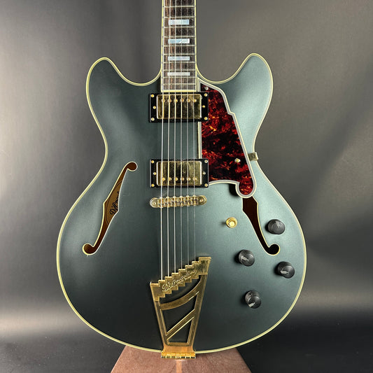 Electric guitar with a distinctive design on a gray background