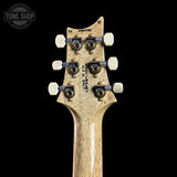 Guitar headstock with brand name on a black background