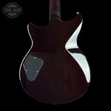 The rear view of an electric guitar with a glossy dark reddish-brown finish, featuring a chrome chrome-style body surround and a black pickguard, set against a solid black background.