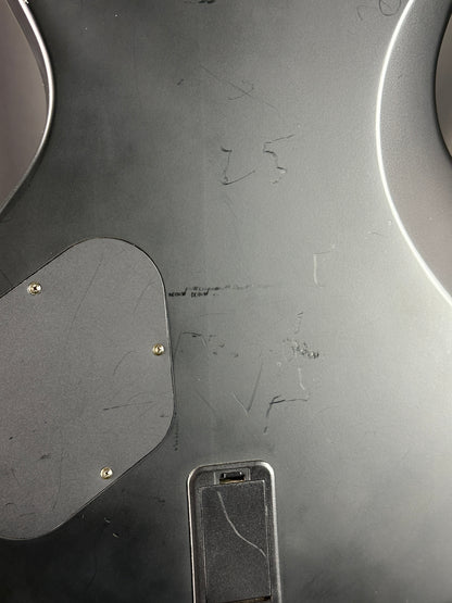 Close-up of a metallic surface with visible wear and tear