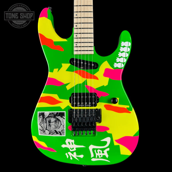 Colorful electric guitar with abstract design on a black background