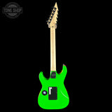 Green electric guitar with a unique neck design on a black background, featuring 'Tone Shop' branding.