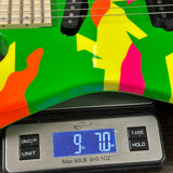 Colorful electric guitar on a digital scale displaying weight