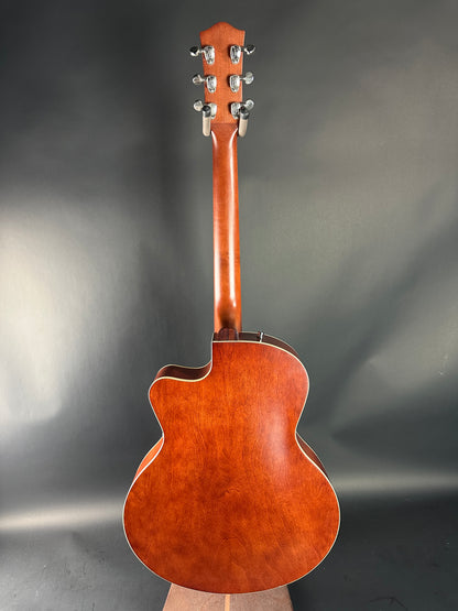Acoustic guitar on a gray background
