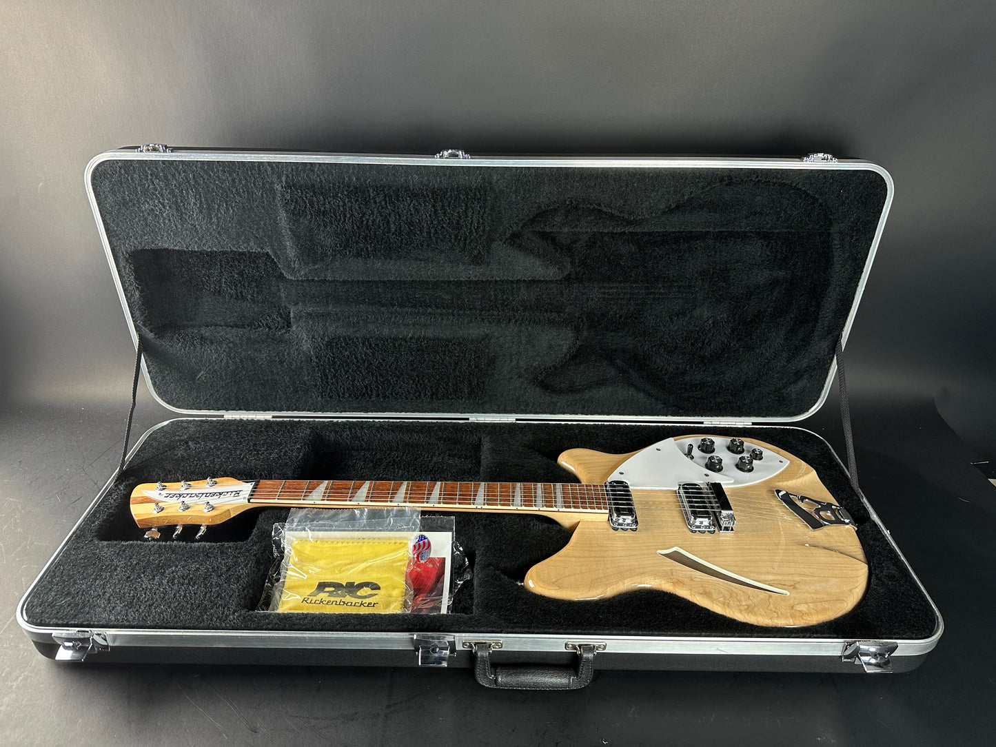 Used 2009 Rickenbacker 360 Mapleglo in case.