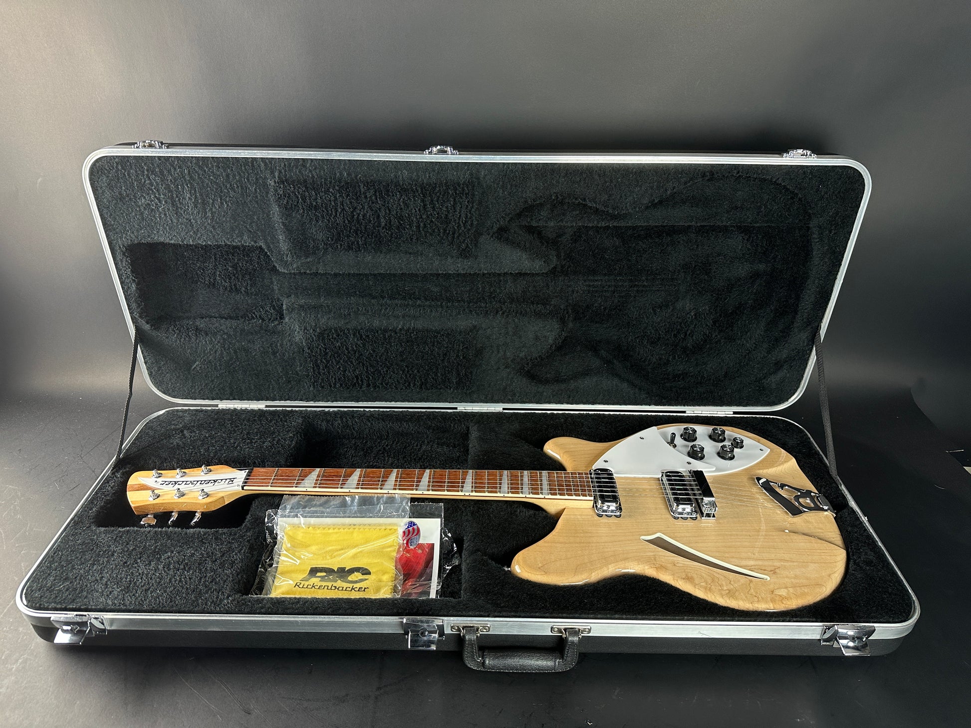 Used 2009 Rickenbacker 360 Mapleglo in case.