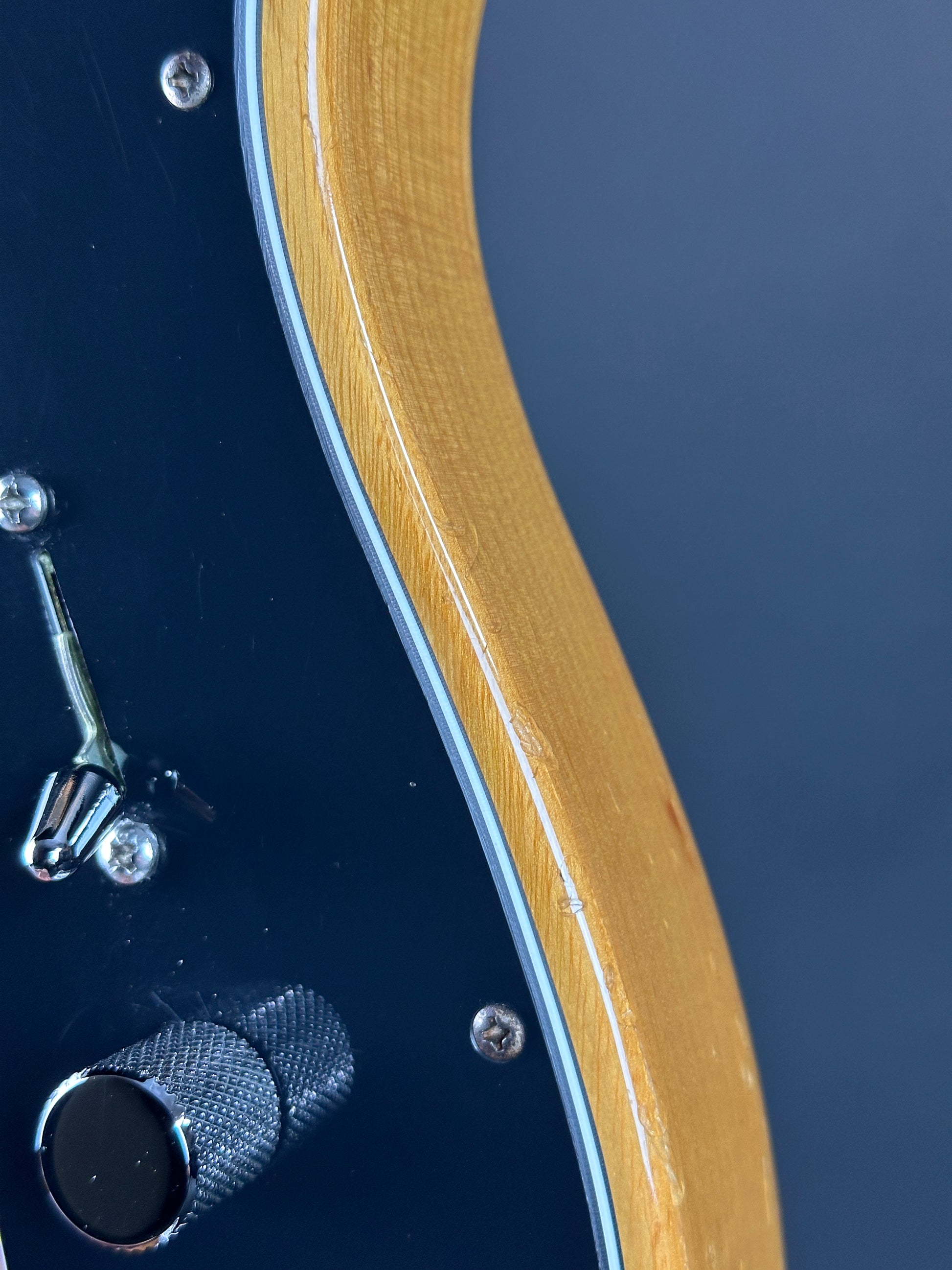 Wear on side of Used 1996 Fender MIJ '72 Thinline Telecaster Natural.