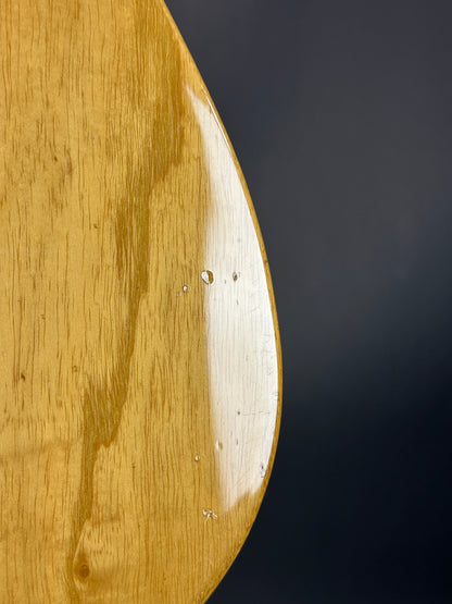 Close-up of a wooden surface with a dark background