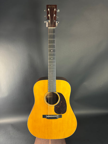 Acoustic guitar on a gray background