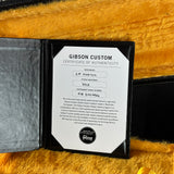 Gibson Custom Certificate of Authenticity on a textured surface