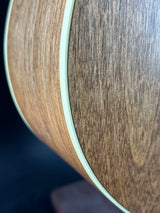 Close-up of a wooden surface with a dark background