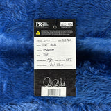 PRS guitar label on a blue textured background