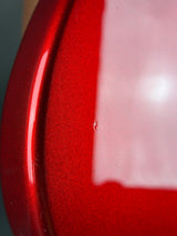 Close-up of a red object with a white interior