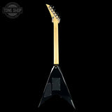 Black electric guitar with a visible brand logo on a black background