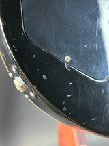 Scratched black surface with metallic elements