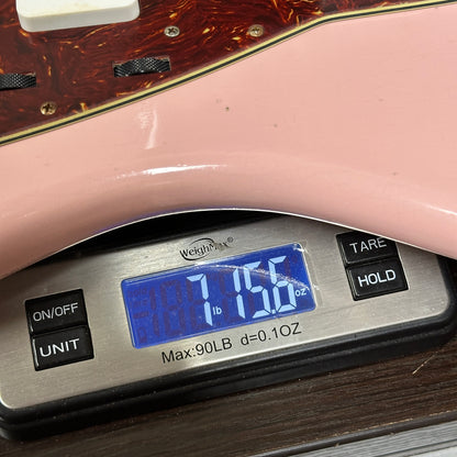 Fender Custom Shop 1962 Jazzmaster Journeyman Relic PHC SPK on scale displaying weight.