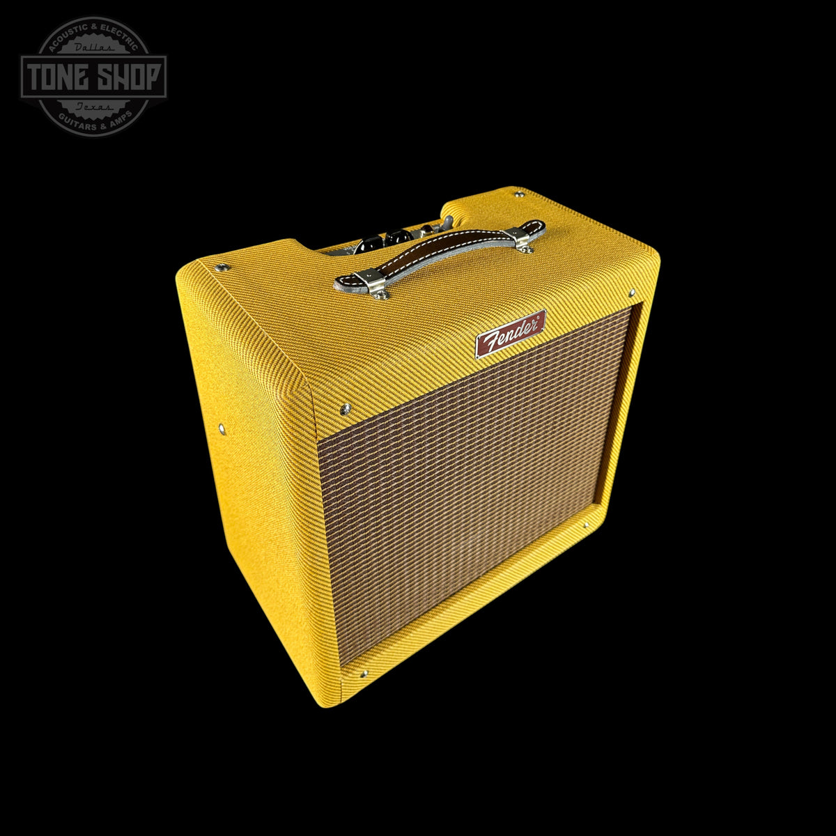 A yellow Fuzz Face guitar amplifier with a textured fabric cover, chrome handle, and front grille, shown on a solid black background with a Tone Shop watermark in the top left corner.