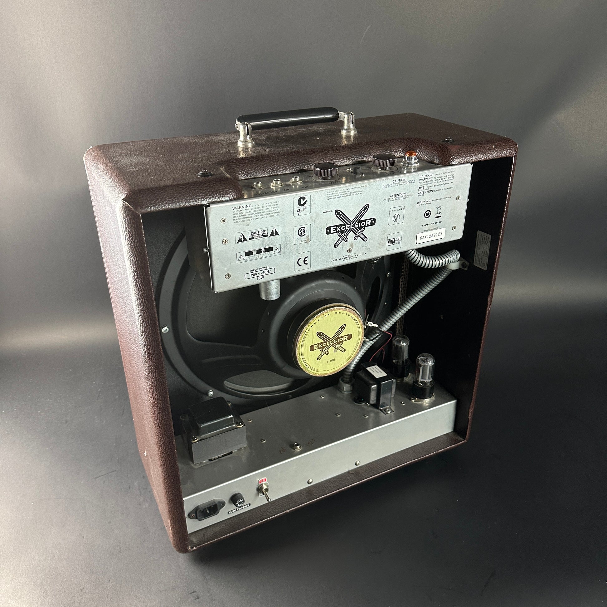 Vintage-style audio amplifier with brand logo on a gray background