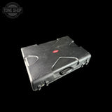 A black hard plastic soundproofing case with a red oval Diasonics logo on the lid, shown at an angle against a solid black background.