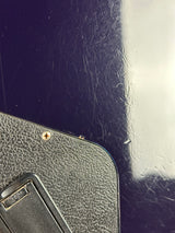 Close-up of a textured surface with a metallic object