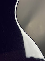 Close-up of scratches on guitar body