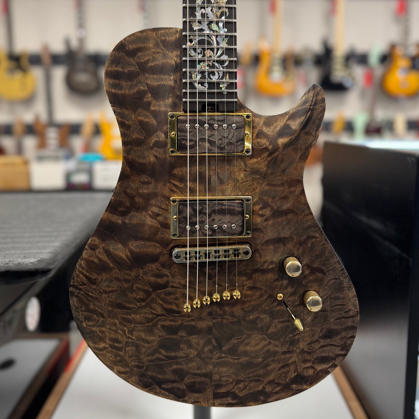 Front of body of Used Warrior King's Closet Isabella Guitar w/Burl top w/Vine of Life w/Bag TSS6756