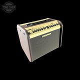 Fishman Loudbox Mini amplifier on a black background with 'Tone Shop' logo.