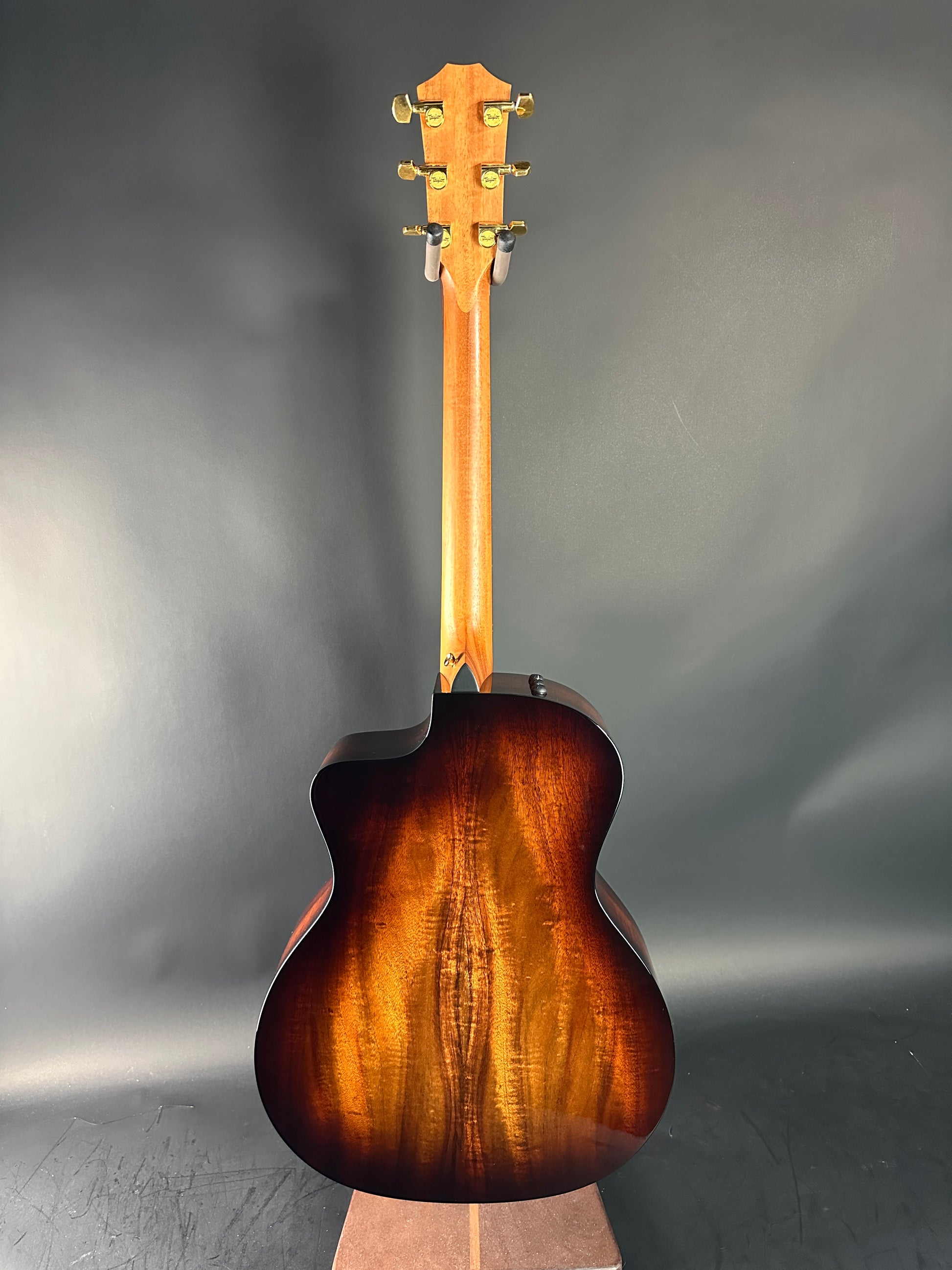 Acoustic guitar on a gray background