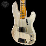 A distressed vintage-style electric bass guitar with a cream/off-white body, a natural wood fretboard, and gold hardware, shown against a solid black background with a Tone Shop watermark in the top-left corner.