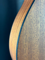 Close-up of a wooden surface with a dark border