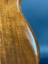 Close-up of a wooden surface with a blue background
