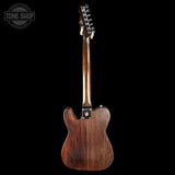 Wooden electric guitar on a black background with 'Tone Shop' logo.