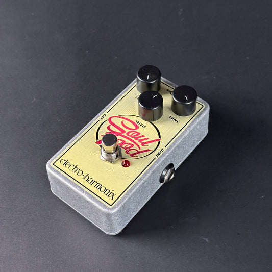 Guitar effects pedal with 'Soul Food' branding on a dark background