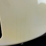 Close-up of a guitar's soundhole and body