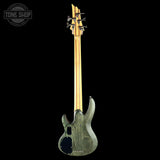 Electric bass guitar with gold fretboard on a black background, featuring 'Tone Shop' logo.