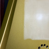 Close-up of a gold phone case with a textured surface