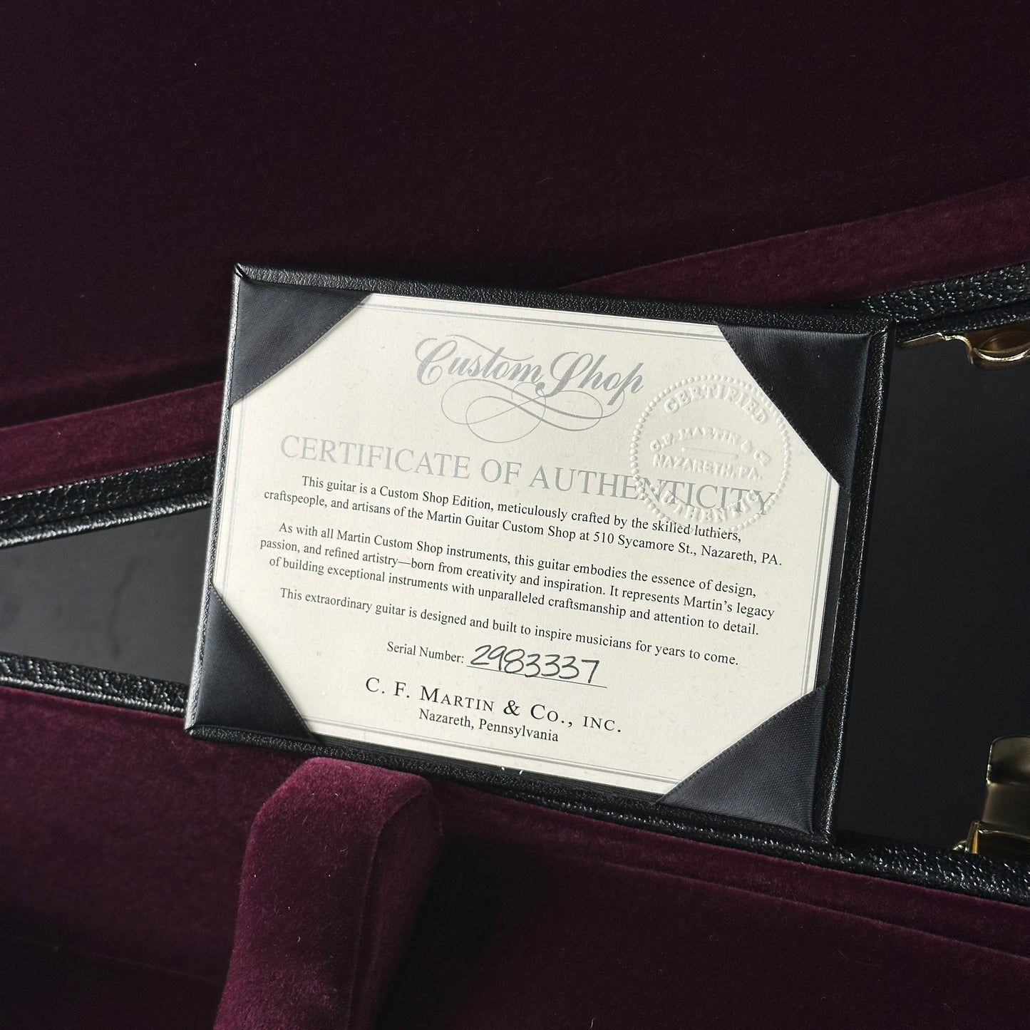 Certificate of Authenticity from C.F. Martin & Co. Inc. on a guitar case.