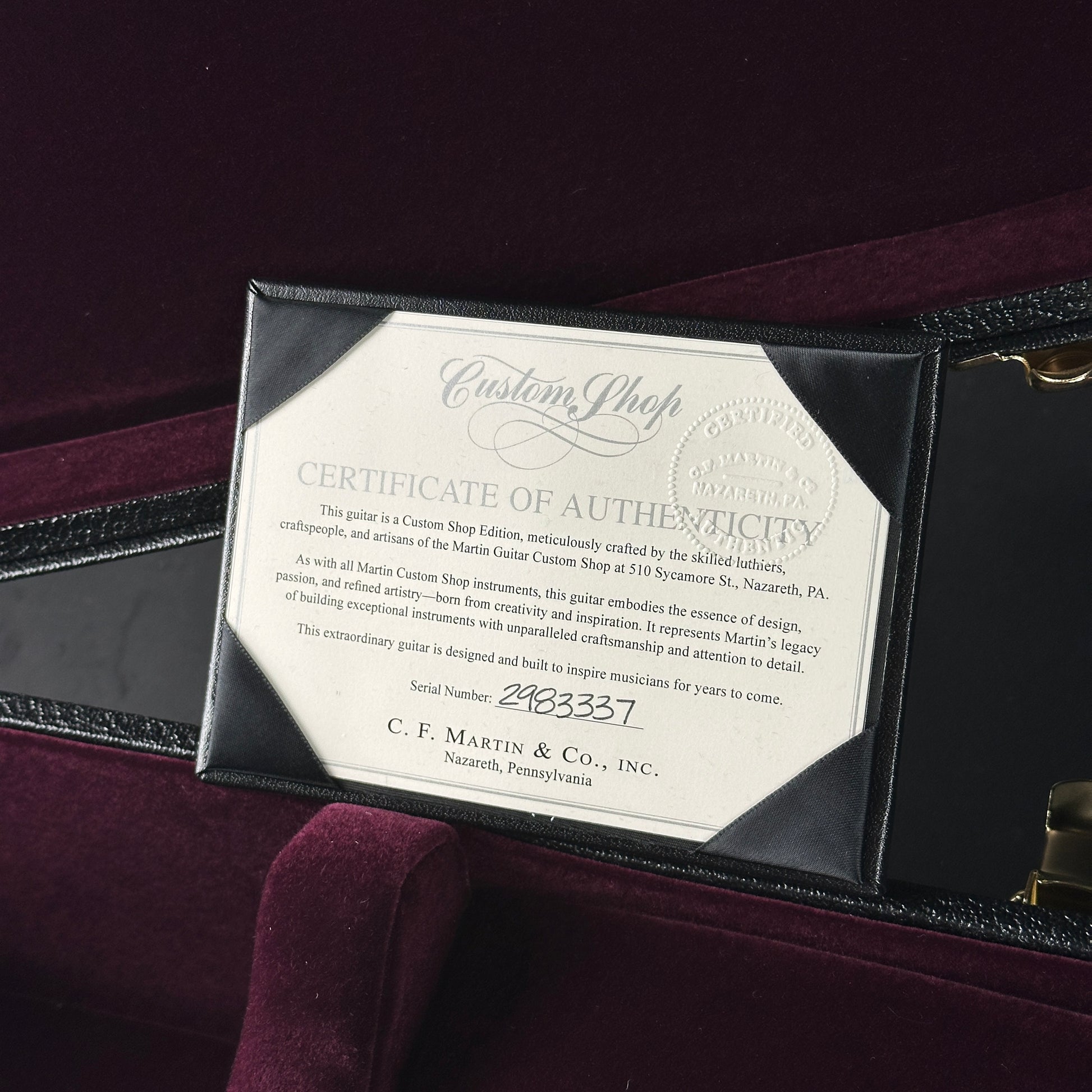 Certificate of Authenticity from C.F. Martin & Co. Inc. on a guitar case.
