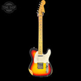 A classic Fender Telecaster electric guitar with a distressed sunburst finish, featuring a yellow body, orange and red edges, and a black outer edge. It has a cream pickguard and a maple neck with gold-toned tuners, shown against a solid black background with a Tone Shop watermark in the top left corner.