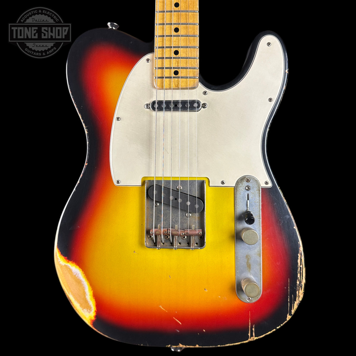 A classic electric guitar with a sunburst finish, featuring a yellow body, orange and red gradients, and a cream pickguard. The neck is made of a light maple wood with black dot inlays.