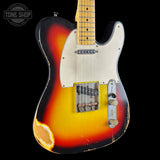 A classic Fender Telecaster electric guitar with a distressed 3-color sunburst finish, featuring a yellow body, orange and black gradients, a cream pickguard, and a maple neck, shown against a solid black background.