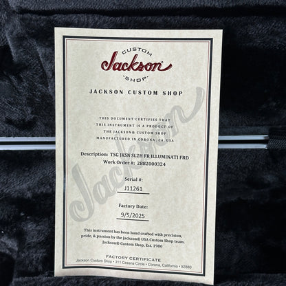 Jackson Custom Shop certificate on a dark textured background