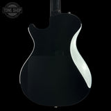 The back of a glossy black electric guitar against a solid black background, featuring a white contoured edge trim and a white circular logo watermark in the upper left corner.