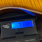 PRS Custom 24 Birds of a Feather Limited Honey Gold on scale displaying weight.