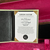 Gibson Custom Certificate of Authenticity on a red background
